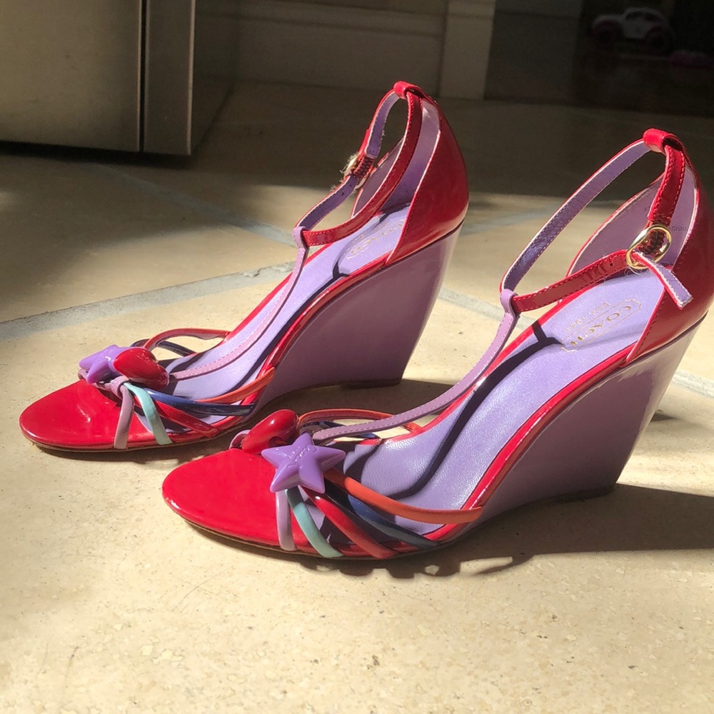 Coach wedge sandals with fun charms.